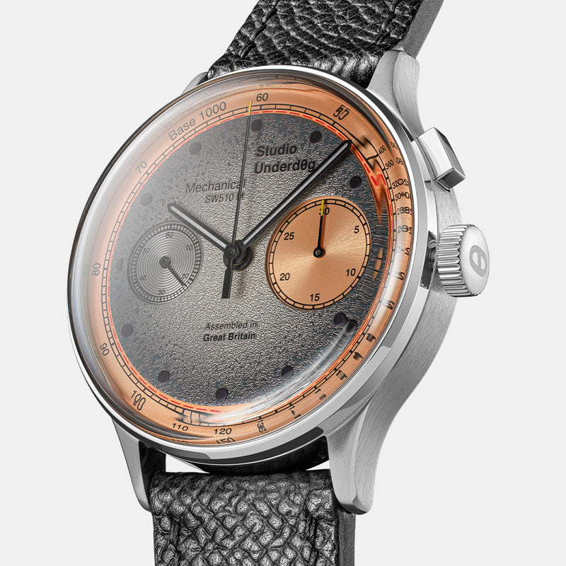 An angled view of the textured dial and contrasting chronograph register.